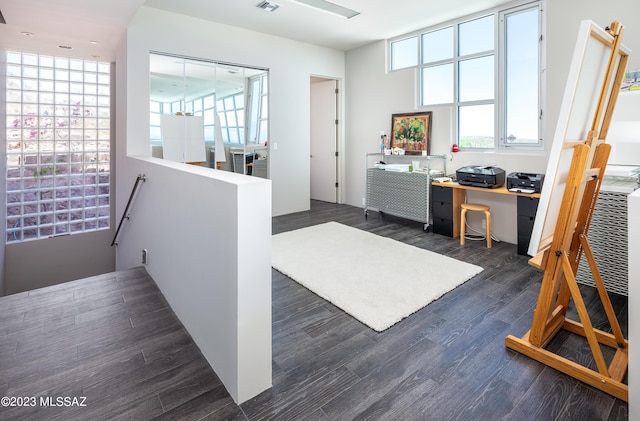 home office featuring dark hardwood / wood-style flooring