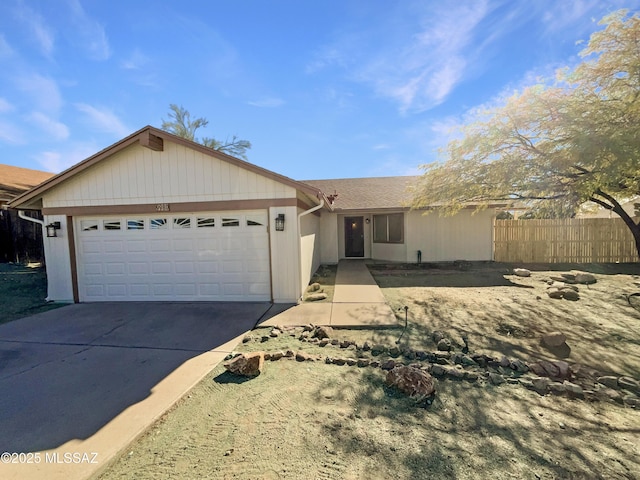 ranch-style home featuring a garage