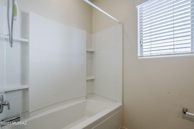 bathroom with shower / tub combination