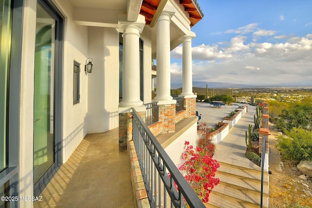 balcony featuring a mountain view