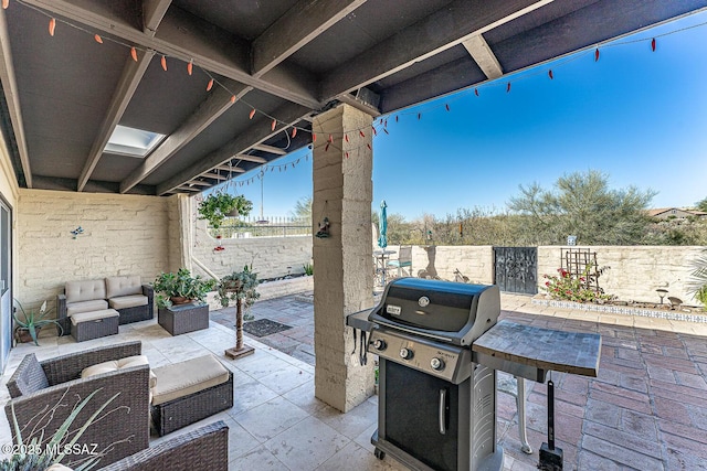 view of patio / terrace with an outdoor hangout area, a grill, and a fenced backyard