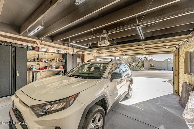 garage featuring a garage door opener