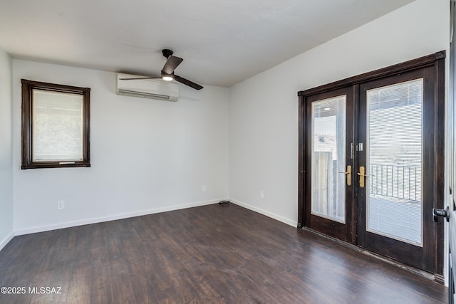 empty room featuring baseboards, dark wood-style floors, ceiling fan, french doors, and a wall mounted AC