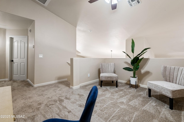 unfurnished room featuring ceiling fan, light colored carpet, and lofted ceiling