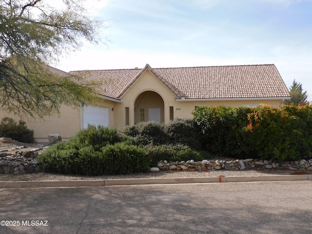 view of front of property featuring a garage