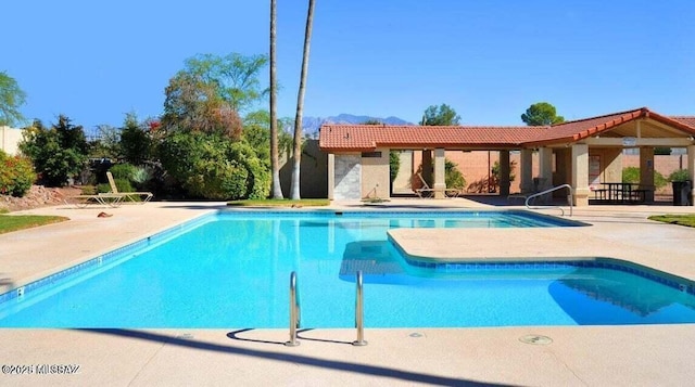 pool with a patio area