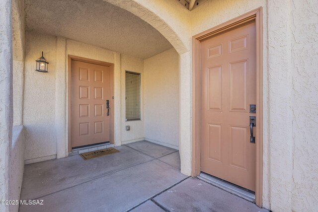 unfurnished room with light carpet, vaulted ceiling, and ceiling fan