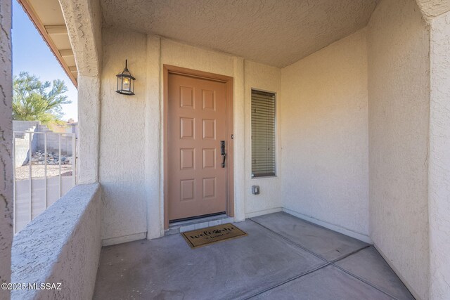 unfurnished bedroom with vaulted ceiling, ceiling fan, a closet, and light carpet