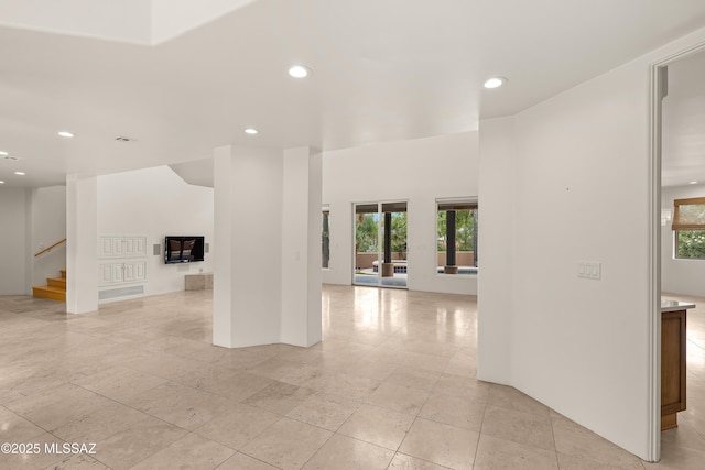 6872 E Desert Wind Ct, Tucson, AZ 85750 - empty room featuring recessed lighting and stairway