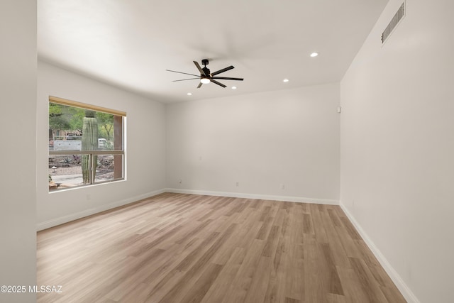 6872 E Desert Wind Ct, Tucson, AZ 85750 - unfurnished room with ceiling fan, light wood finished floors, recessed lighting, and baseboards