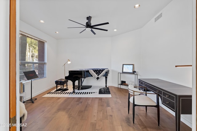 office area featuring visible vents, recessed lighting, baseboards, and wood finished floors