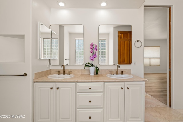 6872 E Desert Wind Ct, Tucson, AZ 85750 - bathroom featuring double vanity