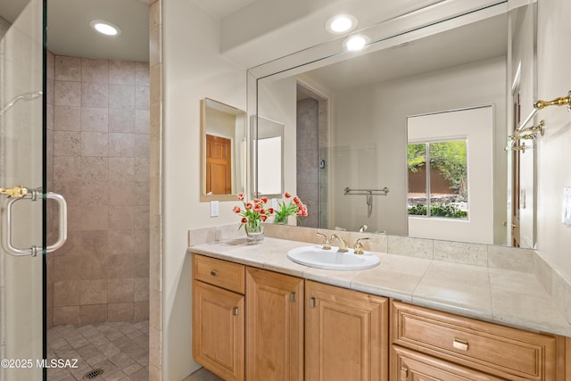 6872 E Desert Wind Ct, Tucson, AZ 85750 - full bathroom featuring a stall shower, vanity, and recessed lighting