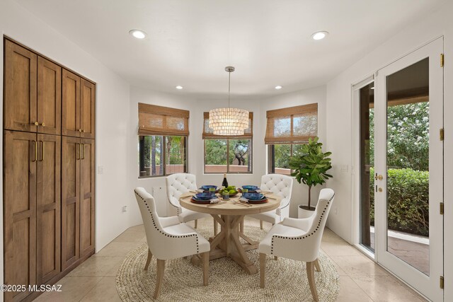 6872 E Desert Wind Ct, Tucson, AZ 85750 - dining area featuring recessed lighting, light tile patterned flooring, and a chandelier