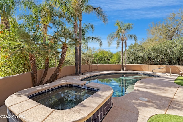 view of swimming pool with a fenced in pool, an in ground hot tub, a fenced backyard, and a patio