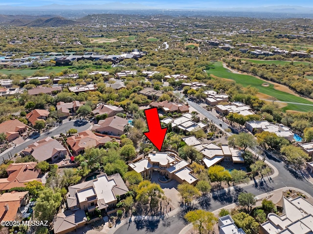 drone / aerial view featuring a residential view and view of golf course