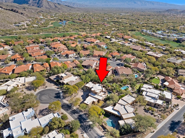 birds eye view of property featuring a mountain view and a residential view