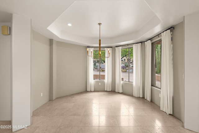 6872 E Desert Wind Ct, Tucson, AZ 85750 - unfurnished room featuring a raised ceiling and recessed lighting