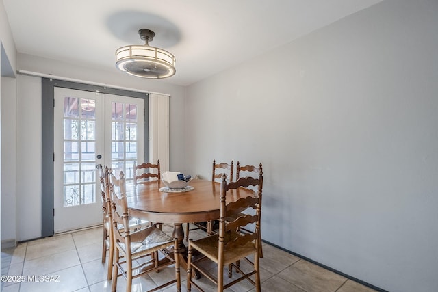 tiled dining space with french doors