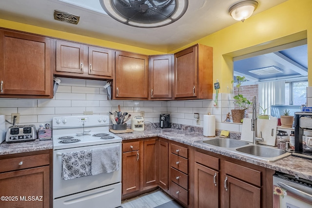 kitchen featuring decorative backsplash, light stone countertops, stainless steel dishwasher, white electric range oven, and sink