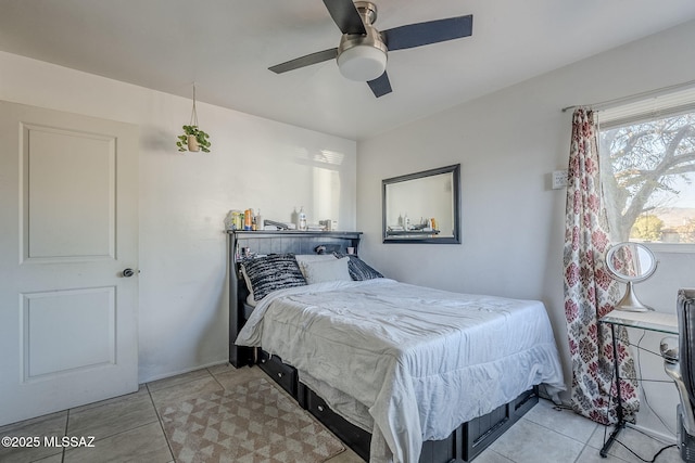 bedroom featuring light tile patterned floors and ceiling fan