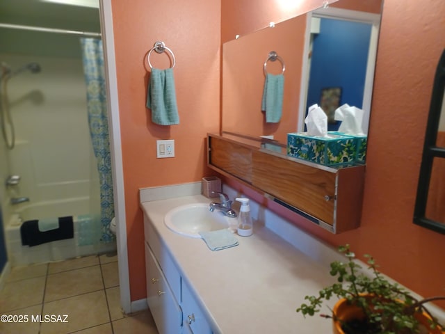 full bathroom with vanity, tile patterned floors, toilet, and shower / bath combo with shower curtain