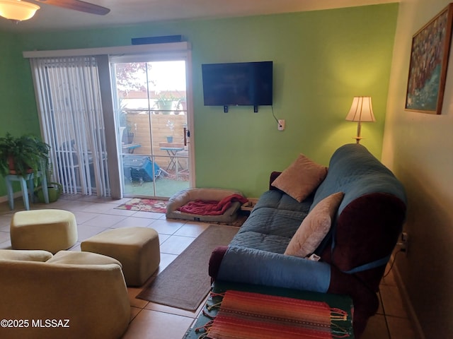 tiled living room featuring ceiling fan