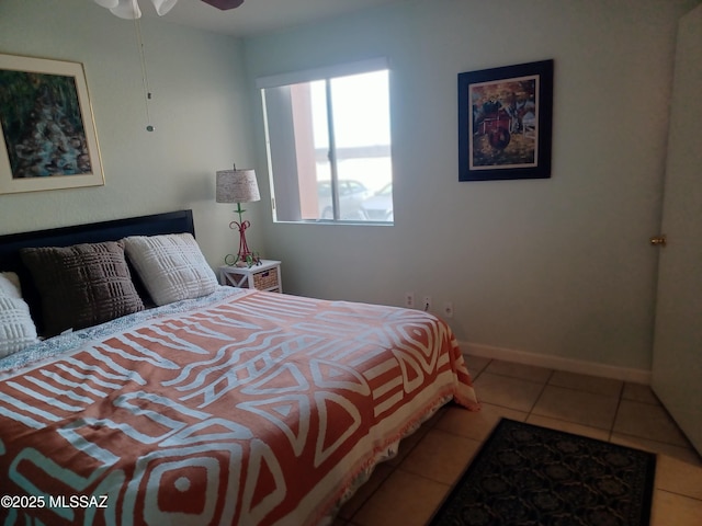 tiled bedroom with baseboards