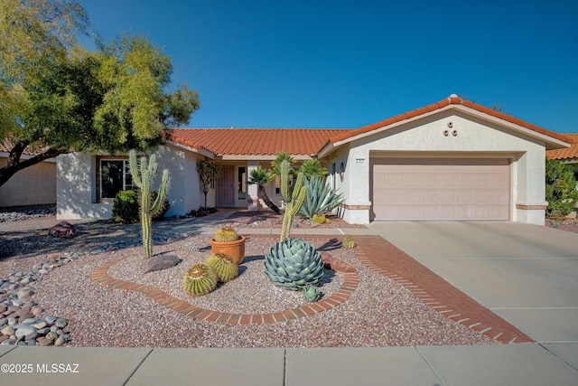 view of front of home with a garage