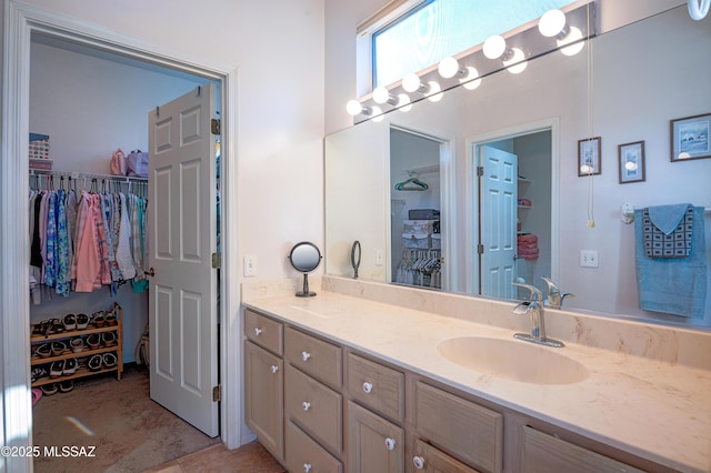 bathroom featuring tile patterned floors and vanity