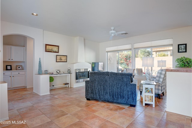 living room featuring ceiling fan