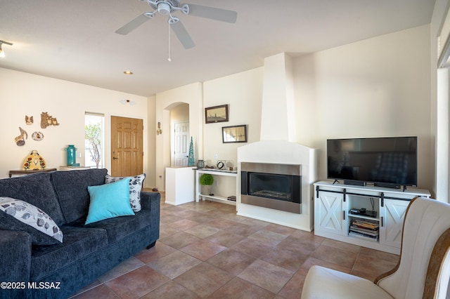 living room featuring ceiling fan