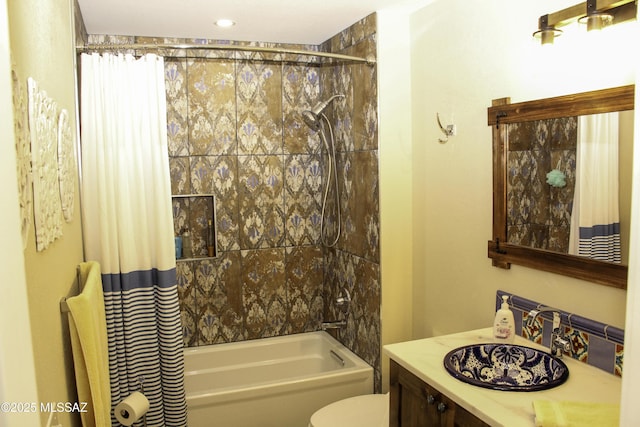 full bathroom featuring vanity, toilet, and shower / bathtub combination with curtain