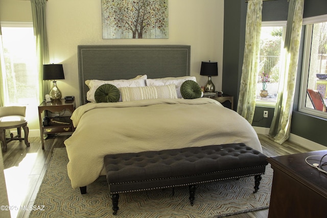 bedroom with light hardwood / wood-style flooring