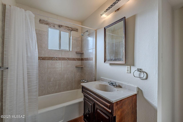 full bath featuring shower / tub combo and vanity