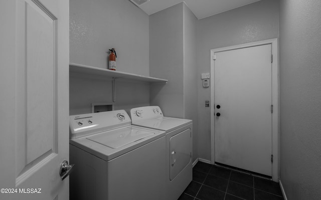 laundry room with washer and dryer