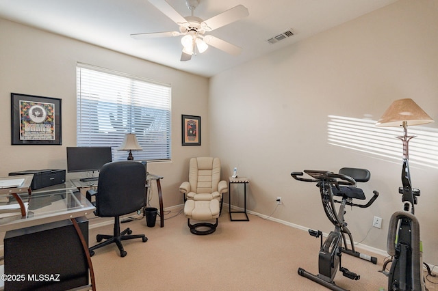 office with ceiling fan and carpet floors