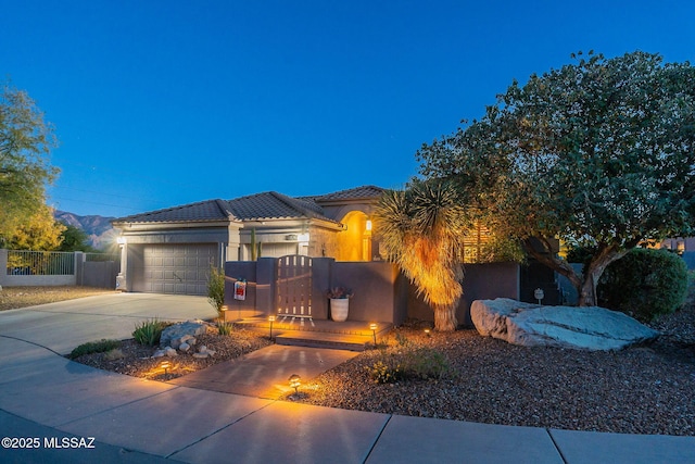 view of front of property featuring a garage