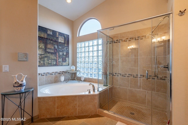 bathroom featuring separate shower and tub and tile patterned floors