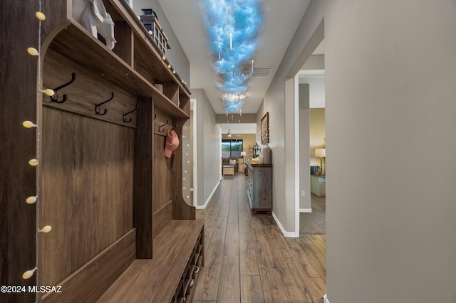 mudroom featuring wood-type flooring