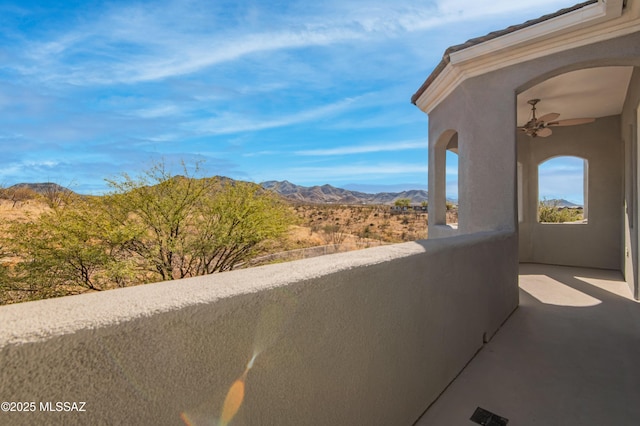 balcony featuring a mountain view