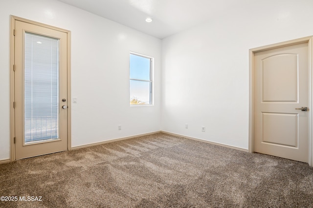 view of carpeted spare room