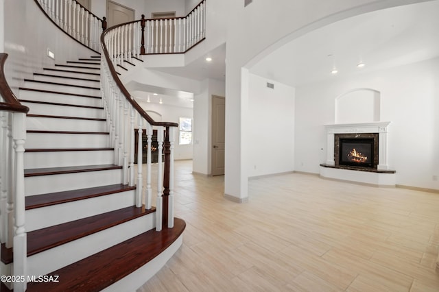 stairs with a fireplace