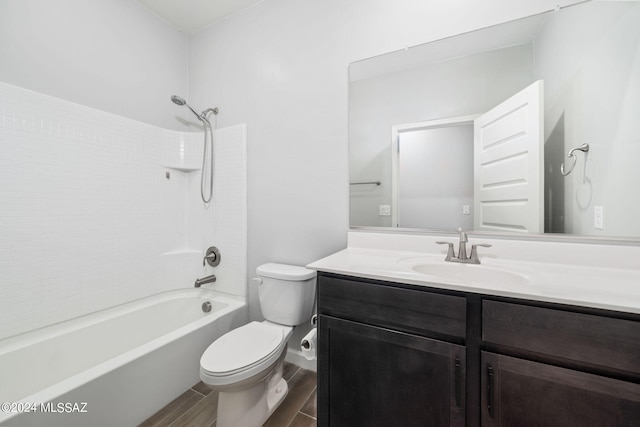 full bathroom featuring vanity, toilet, and bathing tub / shower combination