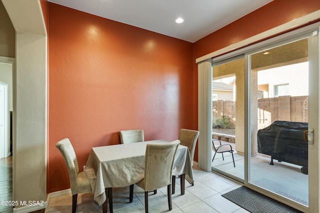 view of tiled dining space