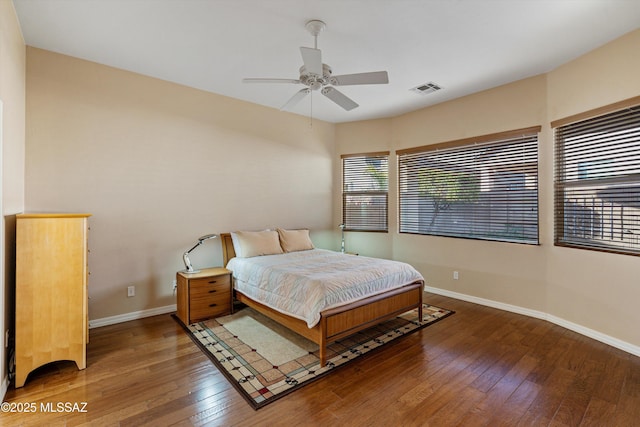 bedroom featuring hardwood / wood-style flooring and ceiling fan