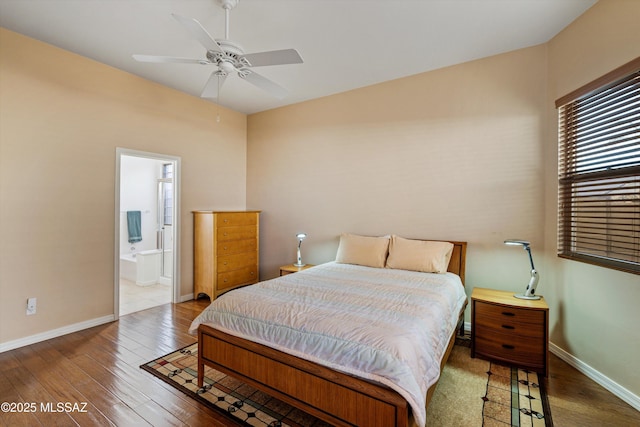 bedroom with hardwood / wood-style flooring, ensuite bath, and ceiling fan