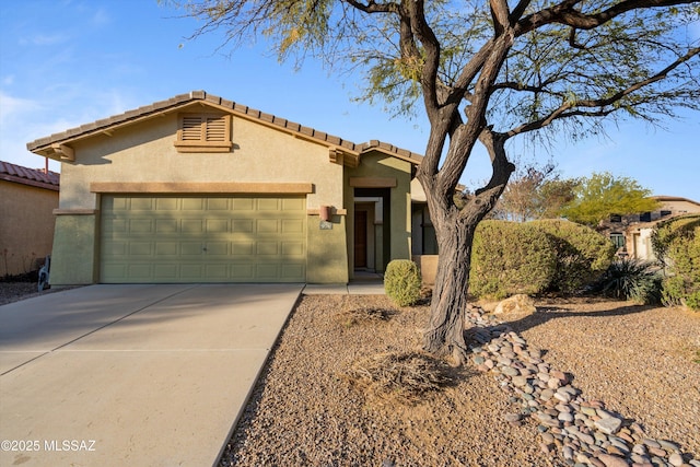 view of front of home with a garage