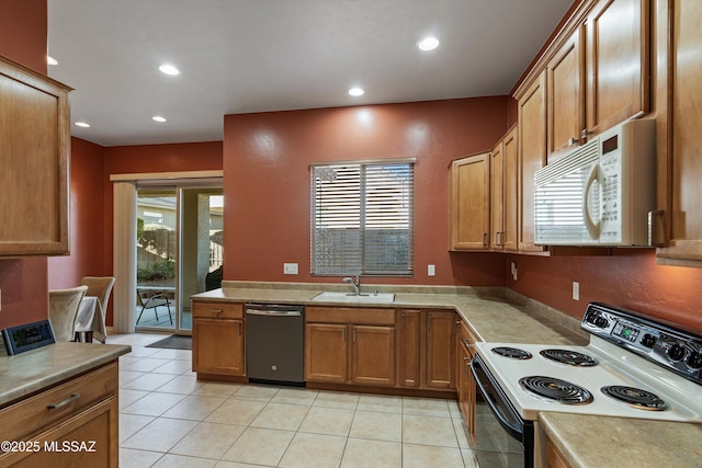 kitchen with electric stove, sink, dishwasher, plenty of natural light, and light tile patterned flooring