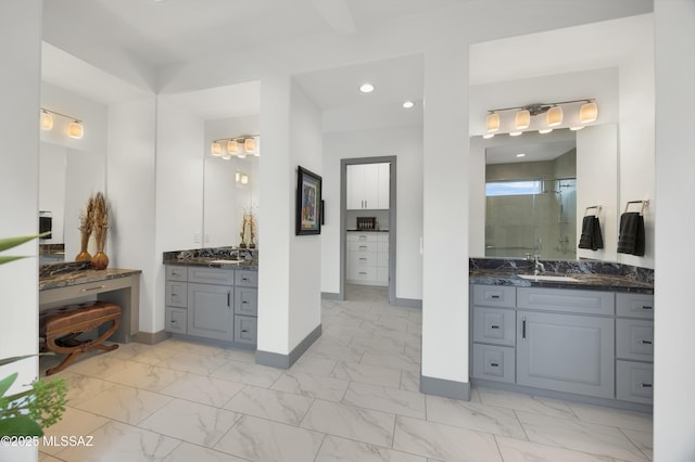 bathroom featuring vanity and walk in shower